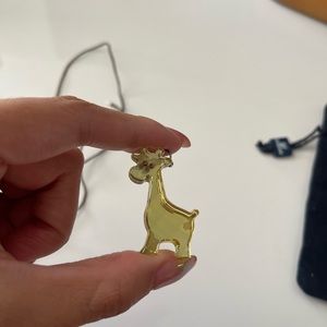 Swarovski yellow giraffe crystal preowned comes W a leather strap